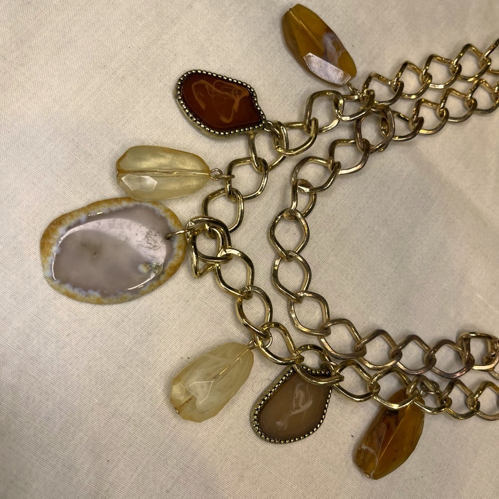 Chico’s. 22” necklace with beautiful stones dangling from second gold tone chain